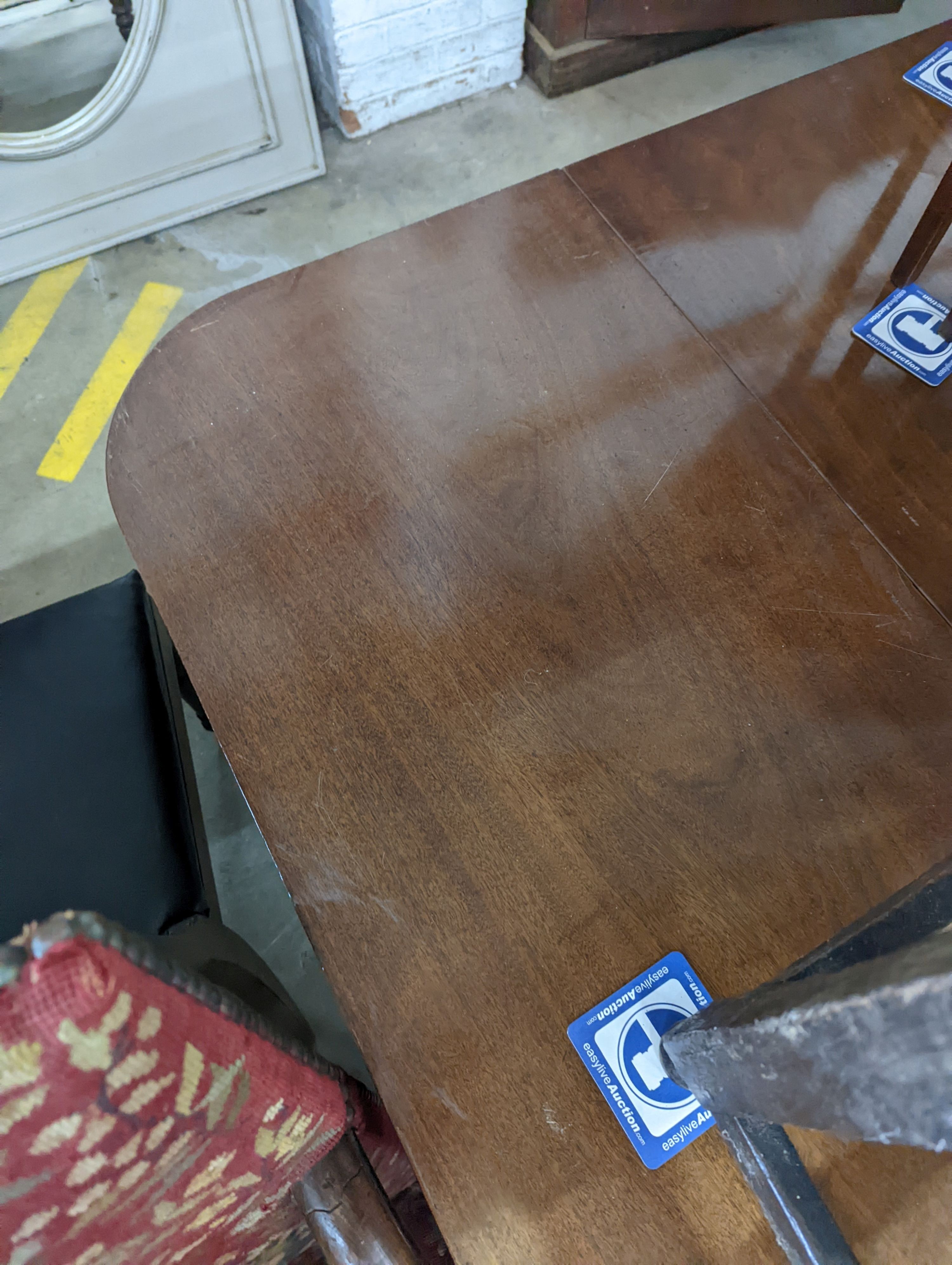 A George IV mahogany D end drop leaf extending dining table, 266cm extended, width 121cm, height 74cm